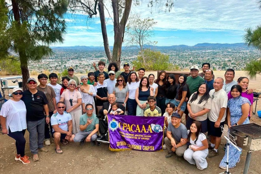 CPAC Alumni Association of America–California Chapter members and families at their annual camp, holding the Southern California Chapter banner