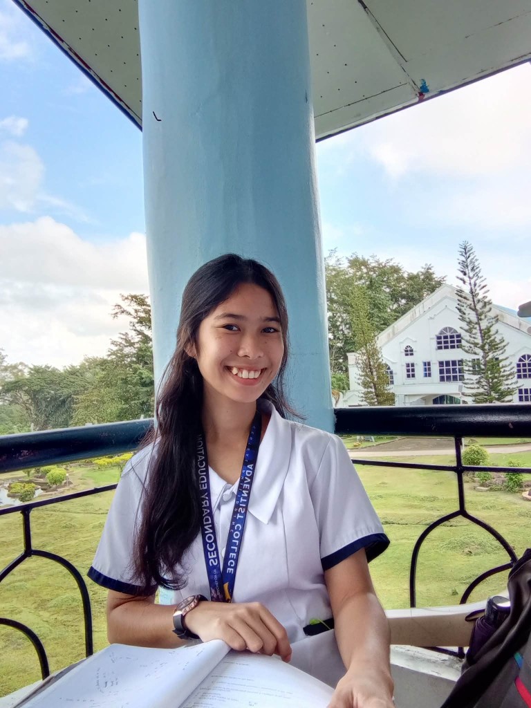 Cristine Manipol Cobre studying on campus at Central Philippine Adventist College