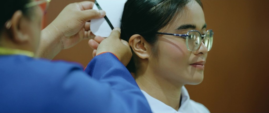 Close-up of a Nursing student receiving her cap