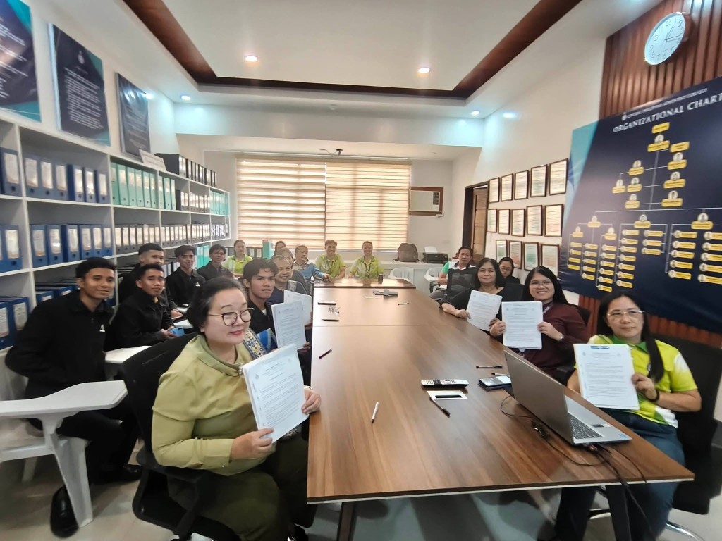 CPAC administrators, JAC Cares Ministry, CES coordinators, and School of Theology student Natanael Brigole holding the signed One Church, One Student Memorandum of Agreement